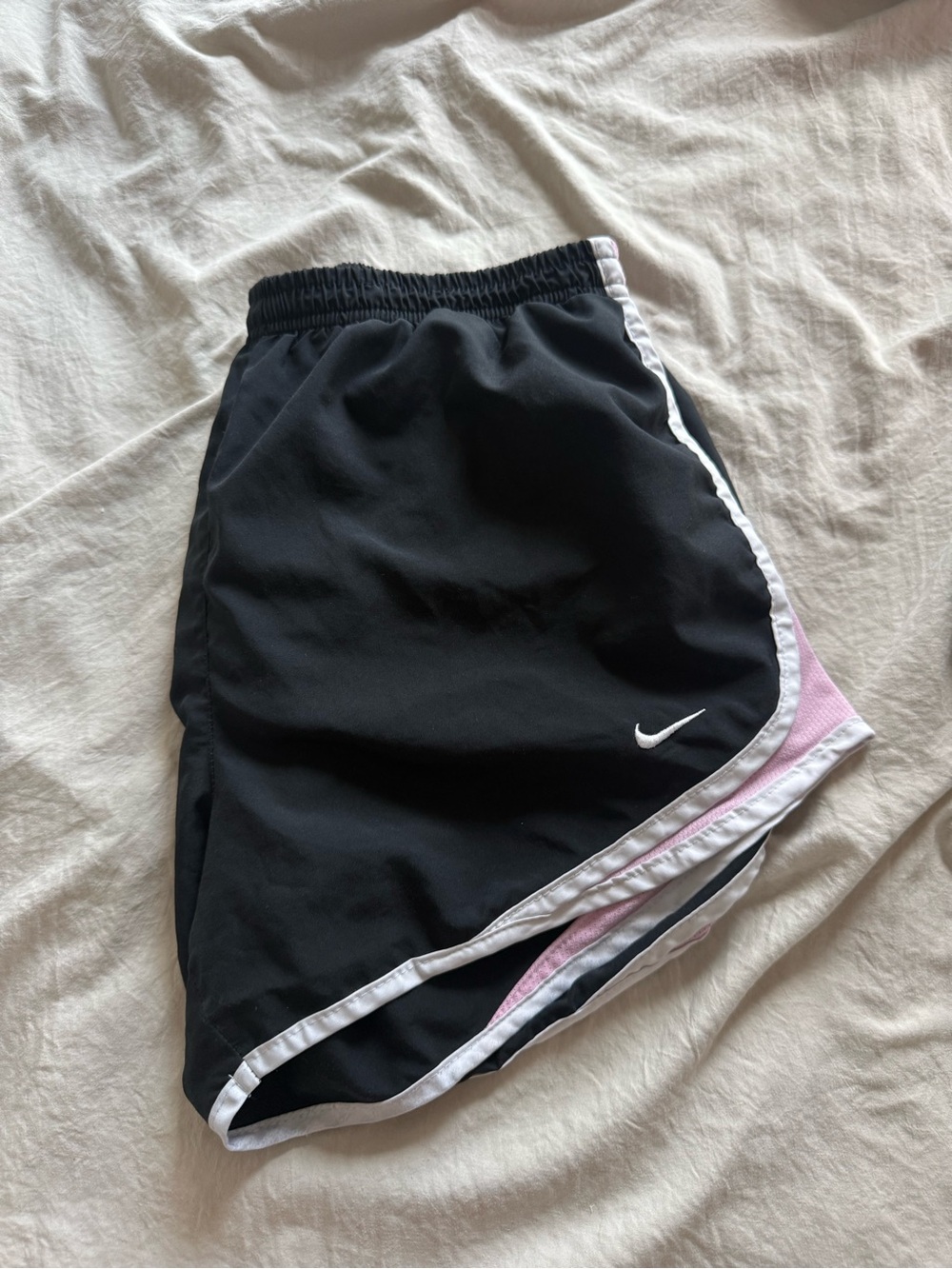 Nike Black Athletic Shorts with White Piping and Pink Accent